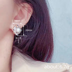 Elegant Two-tone Faux Pearl Stud Earrings With A Geometric Diamond Shape